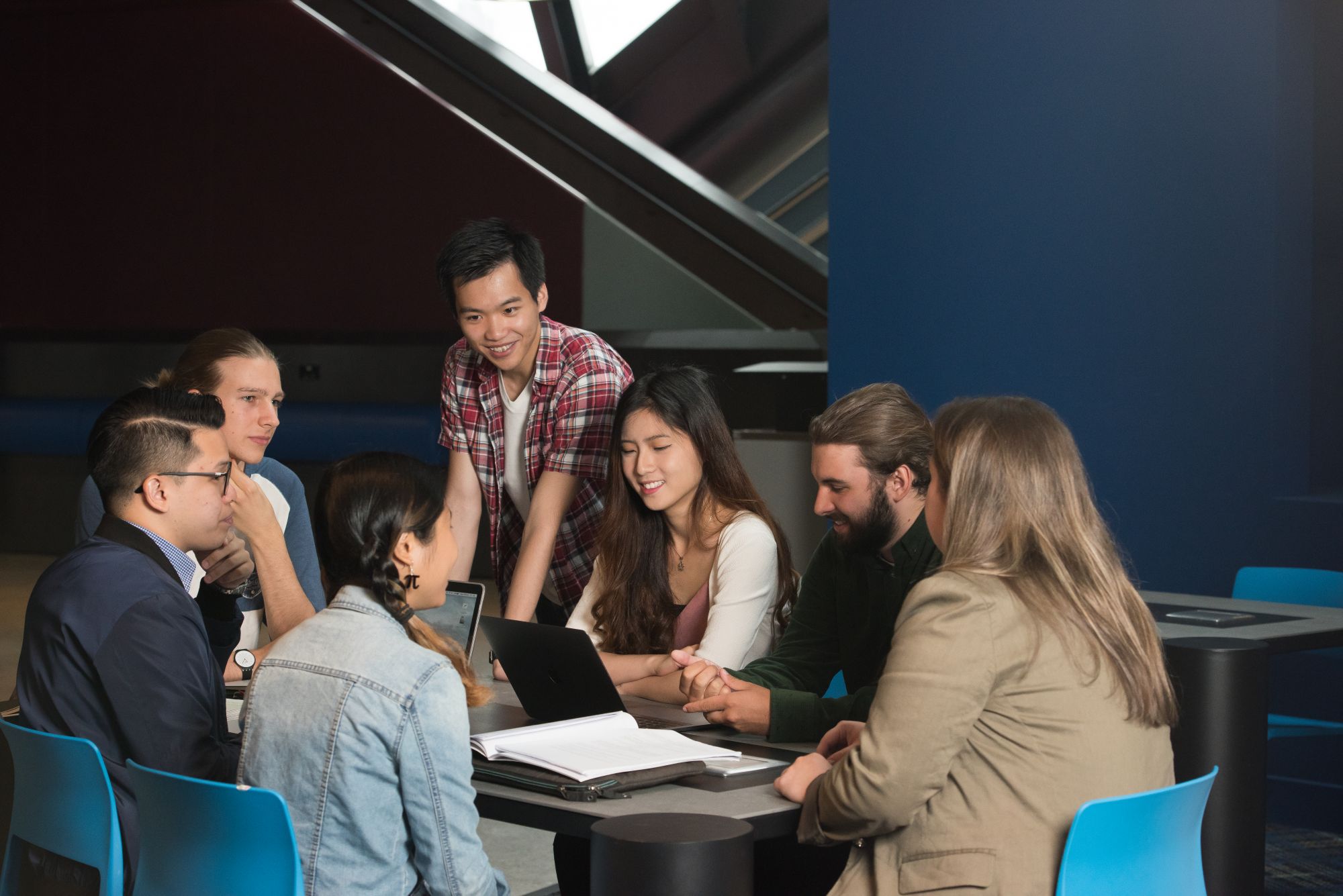 an image of people working collaboratively